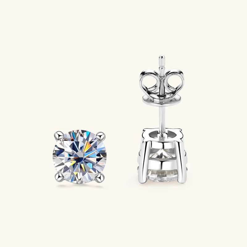 Four-Prong Round Moissanite Stud Earrings in Silver — Silver basket detail