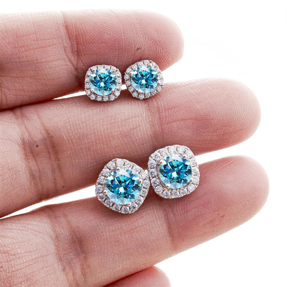 Colored Moissanite Cushion Halo Stud Earrings in Silver - Blue halo size comparison on hand