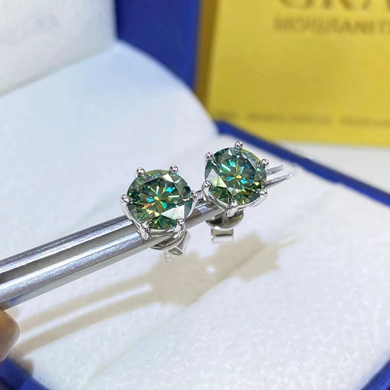 Colored Six-Prong Moissanite Stud Earrings in Sterling Silver - Green studs close-up