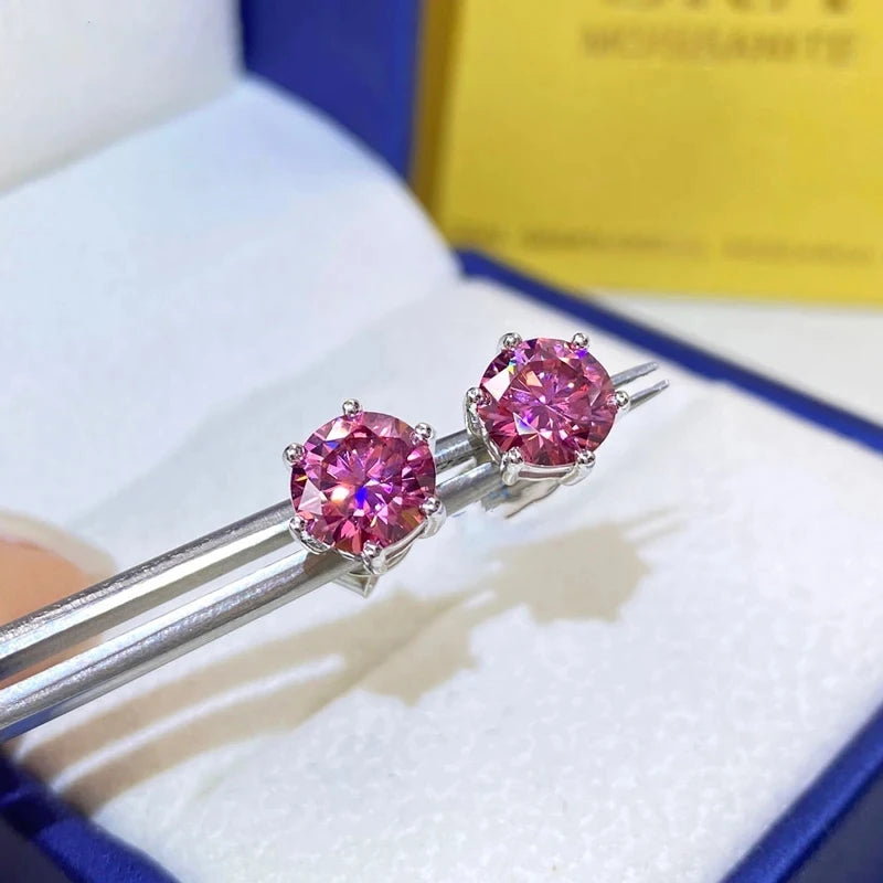 Colored Six-Prong Moissanite Stud Earrings in Sterling Silver - Pink studs close-up