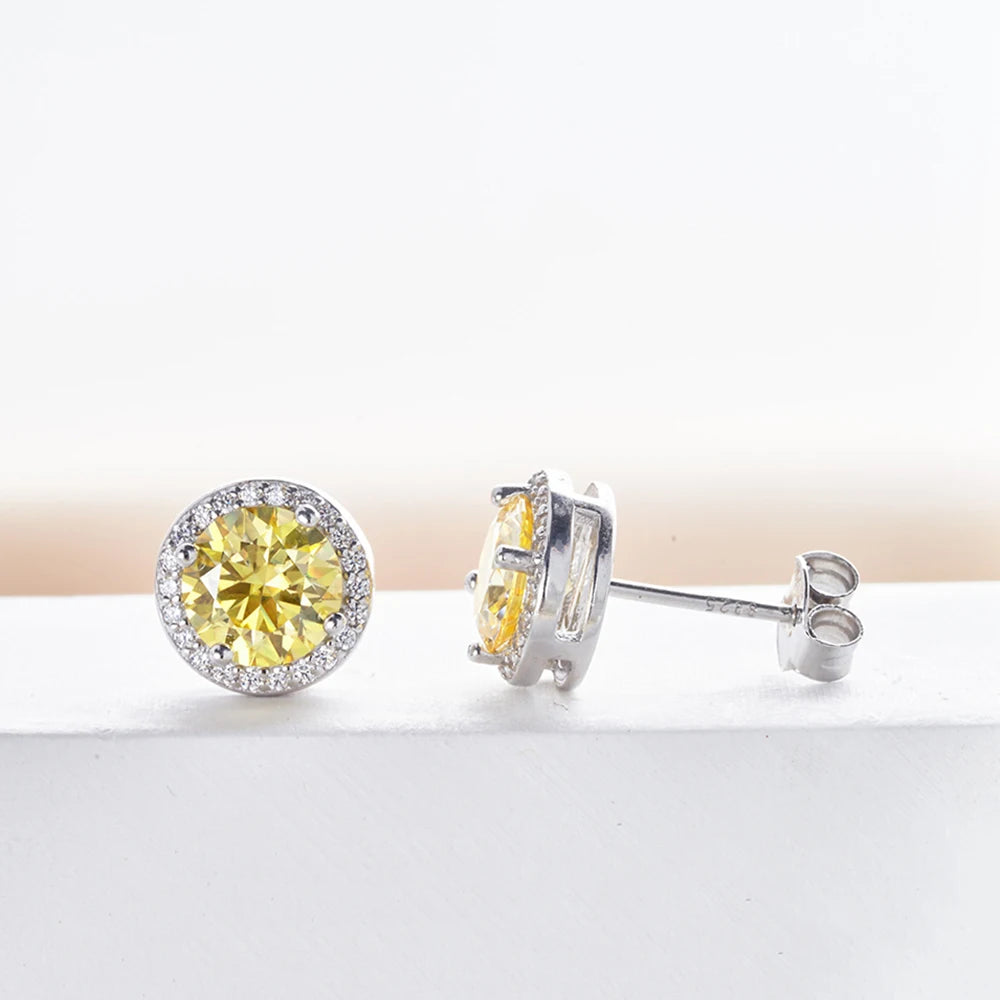Colored Round Halo Moissanite Stud Earrings in Silver - Yellow halo angled view