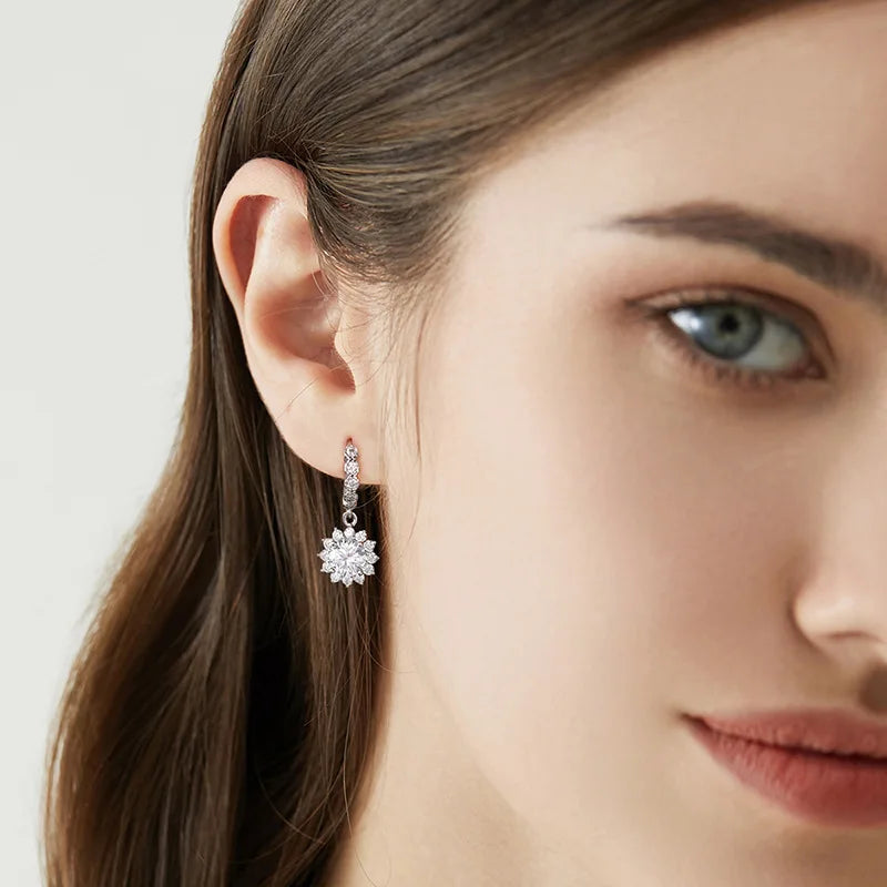 Sunflower Moissanite Drop Hoop Earrings in Sterling Silver - Sunflower drops on model