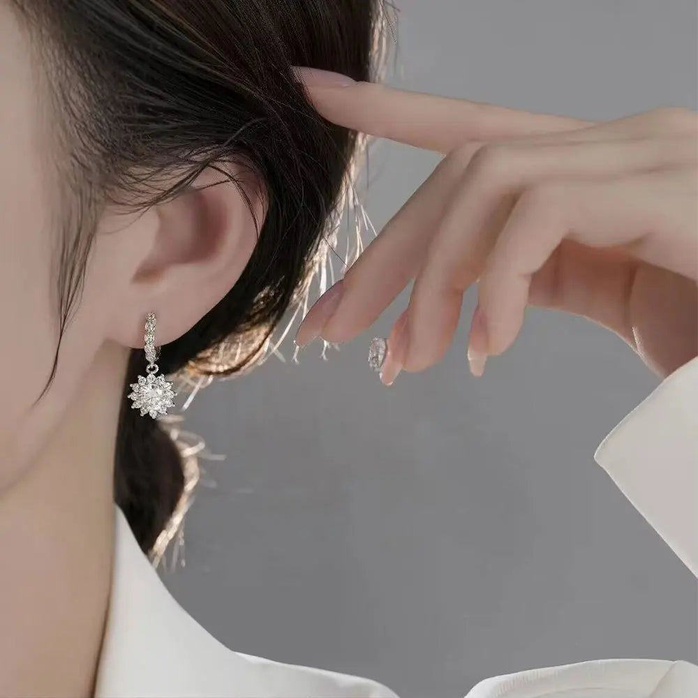 Sunflower Moissanite Drop Hoop Earrings in Sterling Silver - Drop earrings styled on model