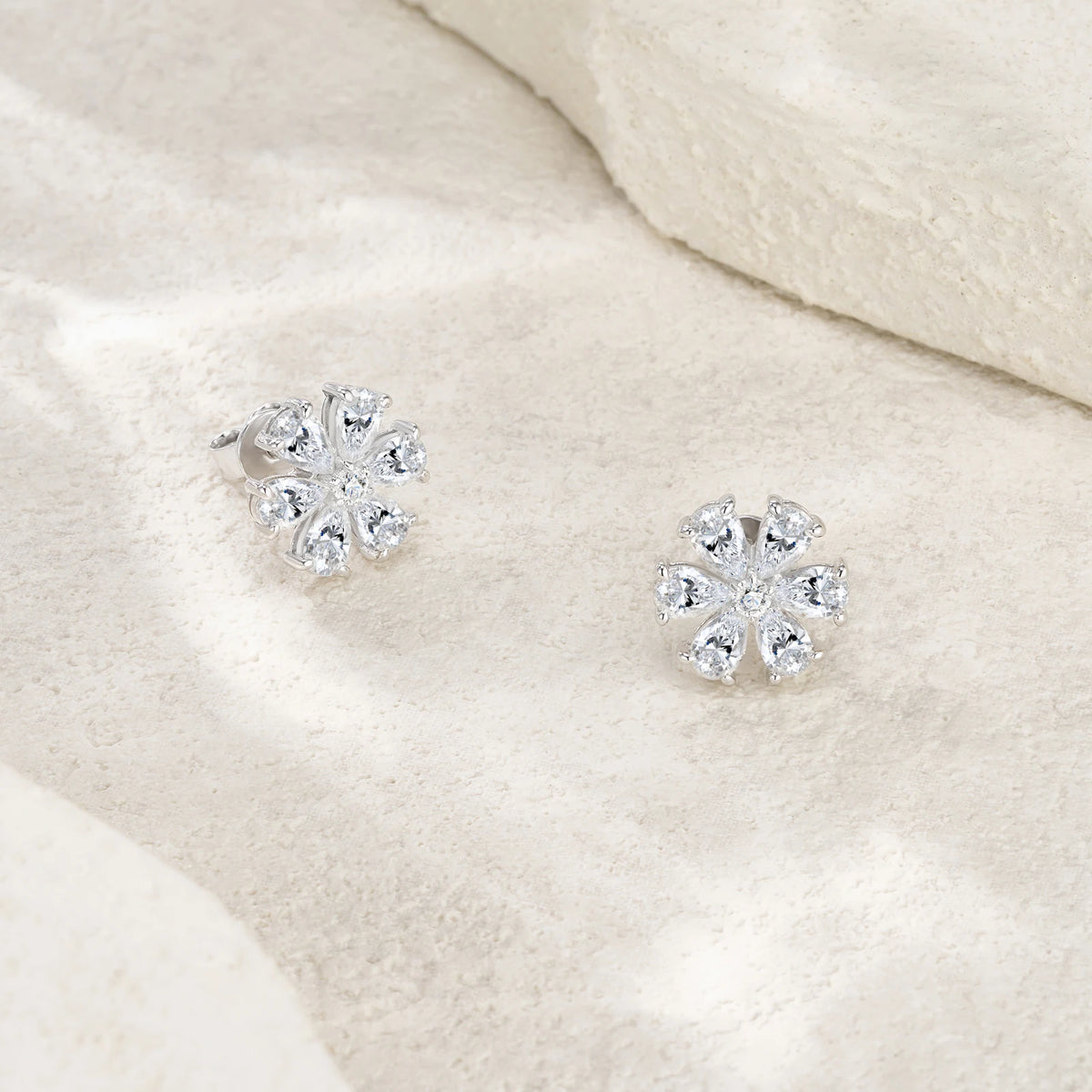 Snowflake Moissanite Cluster Stud Earrings in Sterling Silver — Pear-shaped stone cluster detail