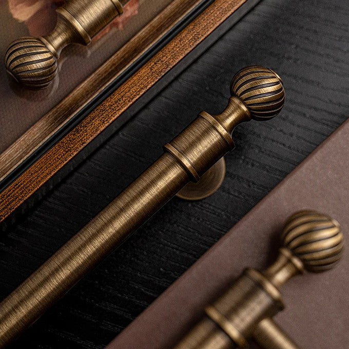 Ribbed solid brass cabinet pull in antique brass