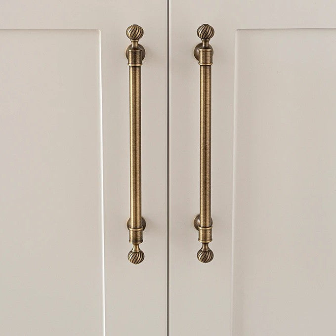 Ribbed solid brass cabinet pull in antique brass