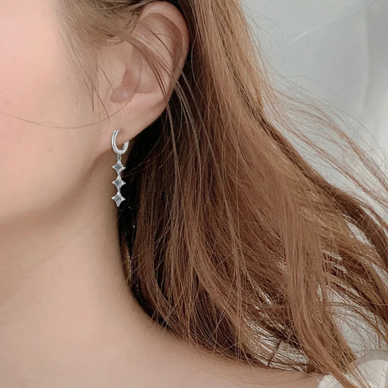 Moissanite Leaf, Star & Bezel Drop Earrings in Sterling Silver — Star drops worn on the ear