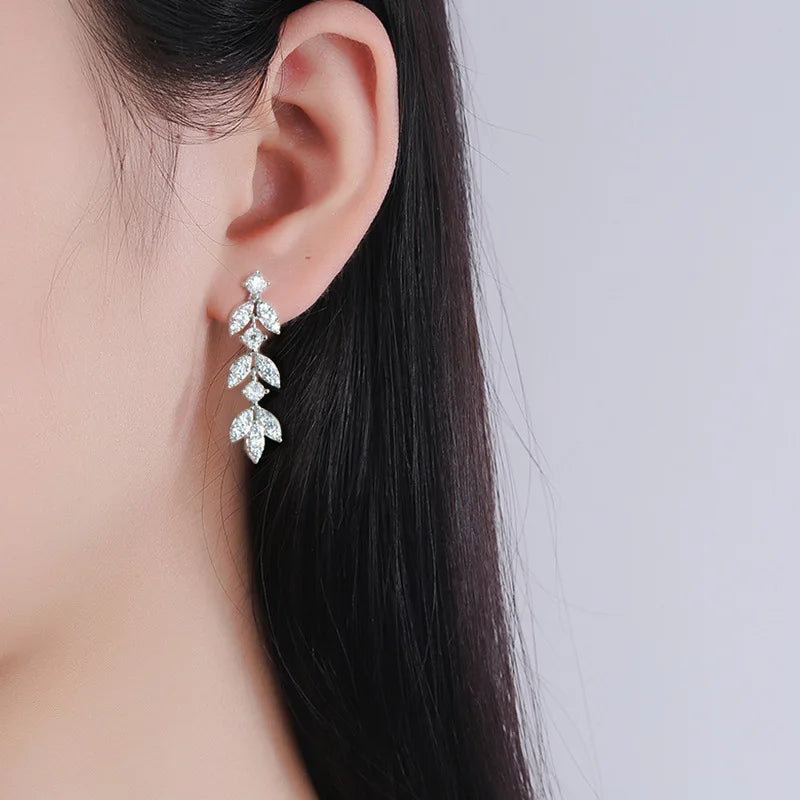 Moissanite Leaf, Star & Bezel Drop Earrings in Sterling Silver — Leaf earrings worn on the ear