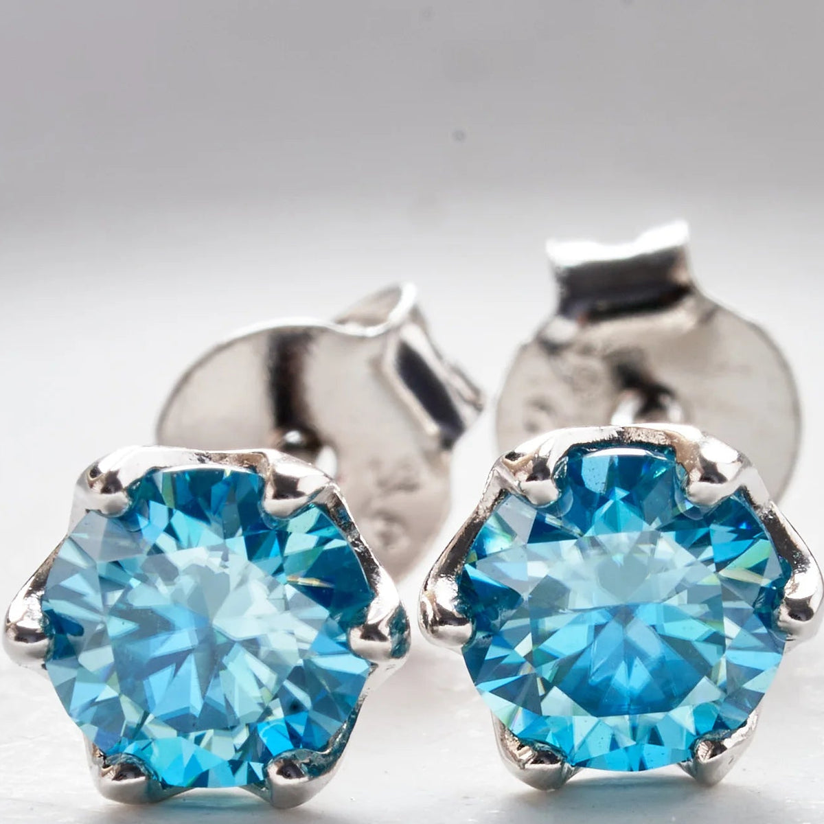 Sea Blue Moissanite Stud Earrings in Sterling Silver — Sea Blue round studs