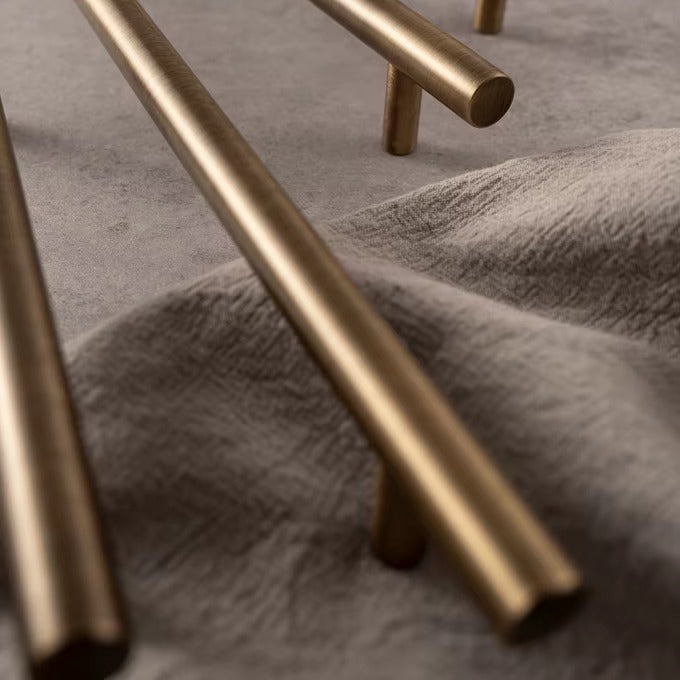 Smooth solid brass bar cabinet pull in antique brass