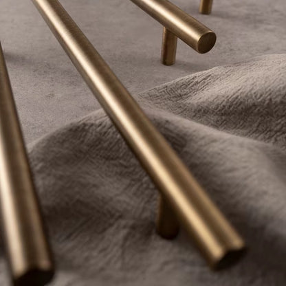 Smooth solid brass bar cabinet pull in antique brass