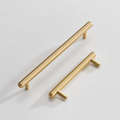 Smooth solid brass cabinet pull in brushed brass