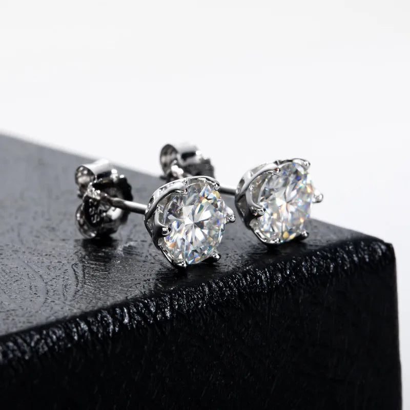 Colored Round Moissanite Stud Earrings in Sterling Silver - white studs on dark fabric