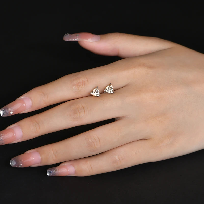 Yellow Trillion Moissanite Stud Earrings in Sterling Silver — Stud held for scale